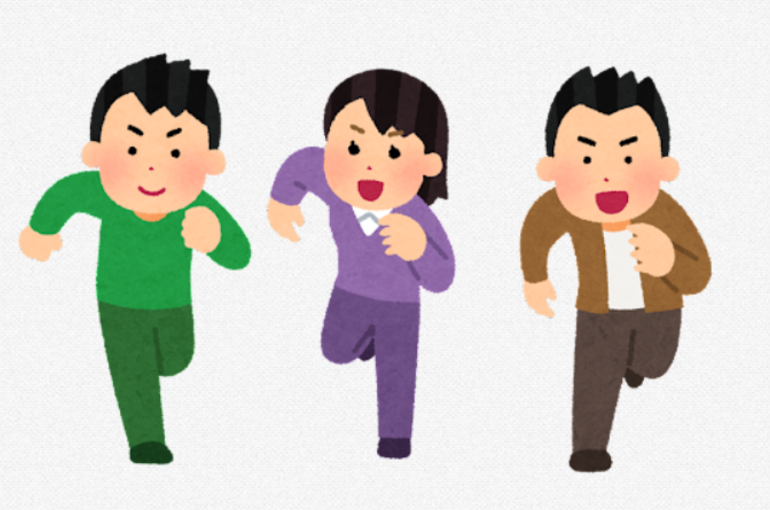 走る人